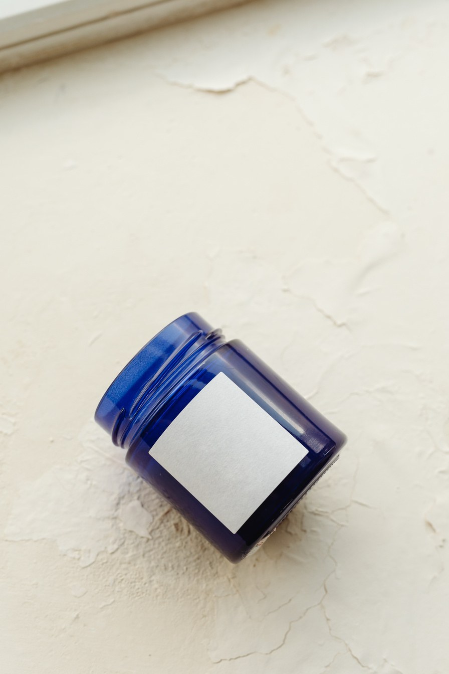 AI-assisted product photography: amber apothecary jar